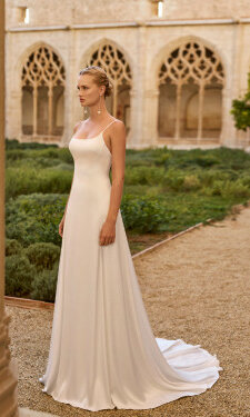 Das Brautkleid Luz von Rosa Clara Brautkleid Nupcia von Rosa Clará mit elegantem Off-Shoulder-Ausschnitt, weitem Rock und dezenter